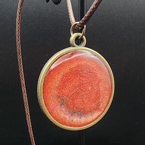 Elegant Red-Orange Swirl Pendant Necklace